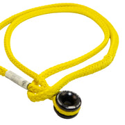 Yellow rope with a black and white object attached on a white background