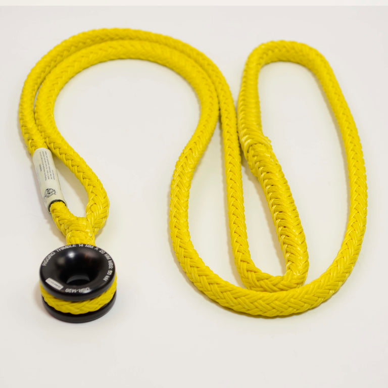 Yellow rope with a black and white handle on a white background