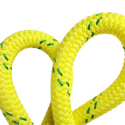 Close-up of flexible yellow double-braided arborist rope with green tracers, ideal for tree rigging, climbing, and professional arborist applications.